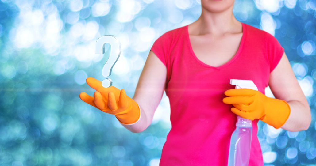 rubber gloves holding a question mark