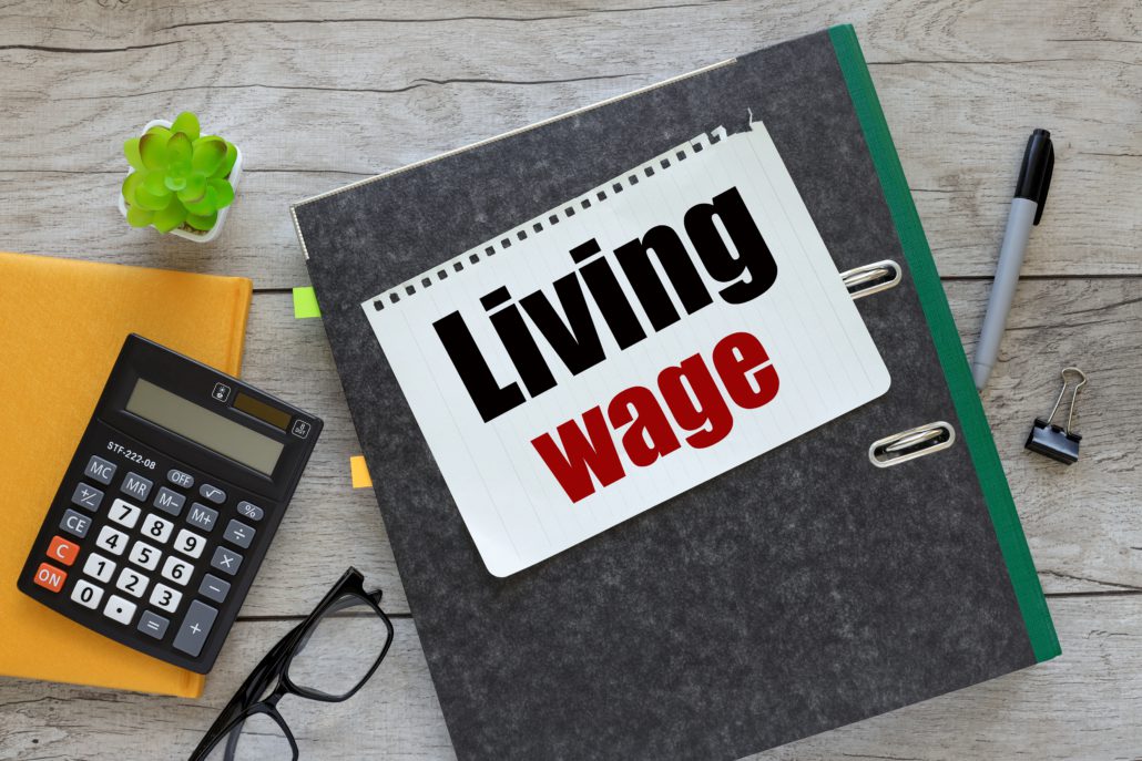 lever arch folder with 'living wage'on the cover