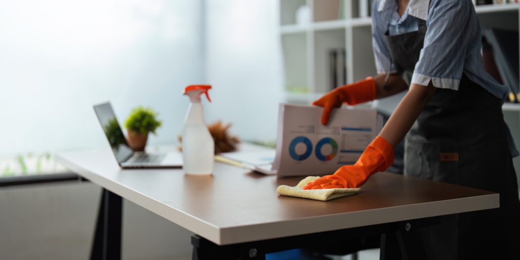 cleaning an office desk